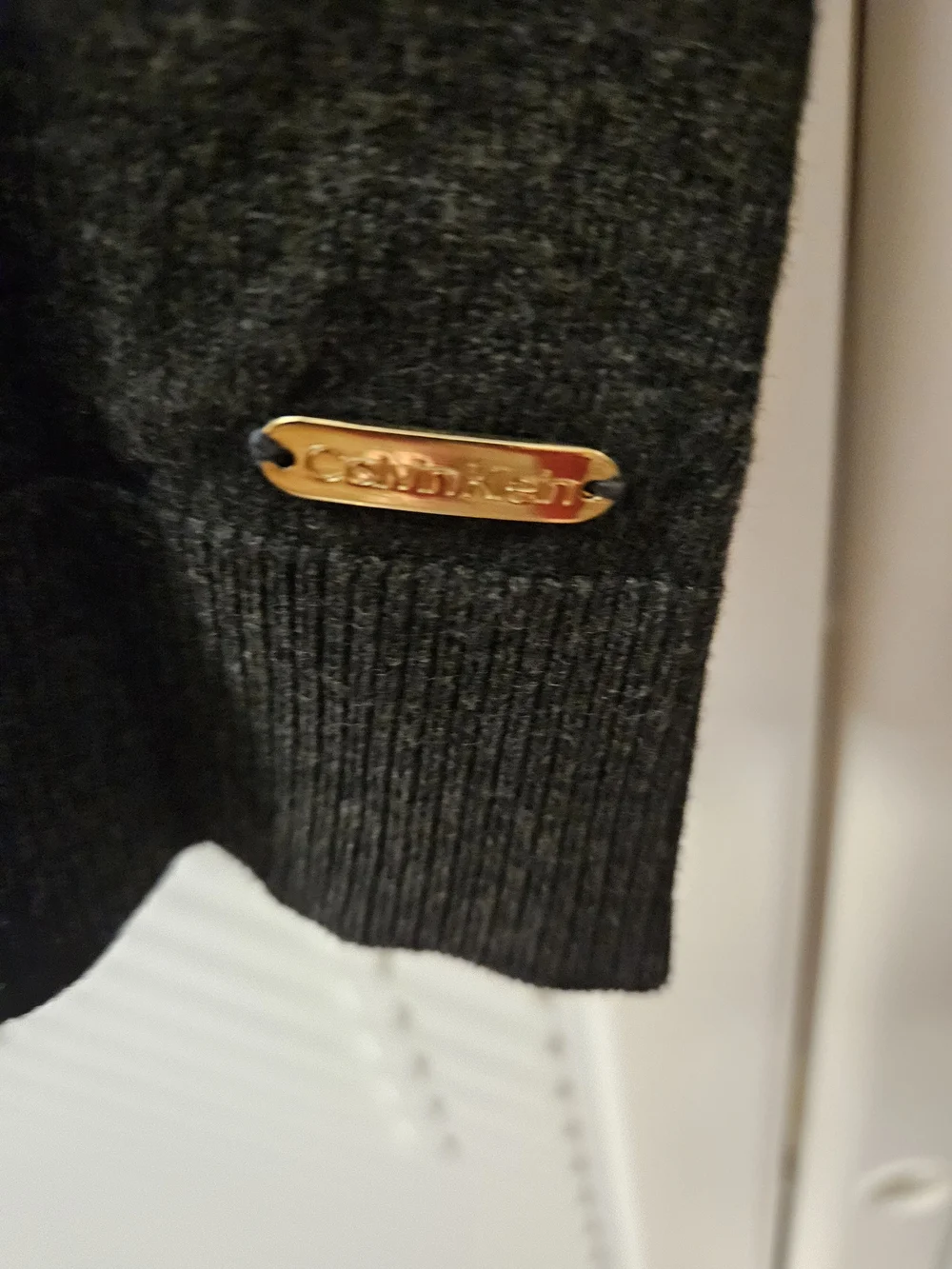 Calvin Klein Dark Gray Mock Neck Sweater with Gold Shoulder Buttons